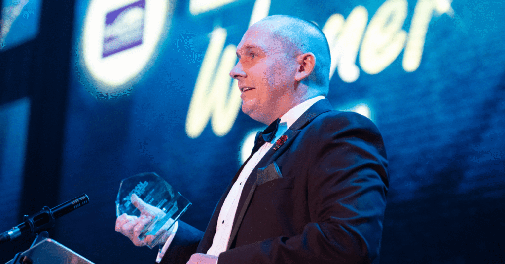 Chris Smith director of CSC2 collecting his Freelancer of the Year Award at Wigan Business Awards